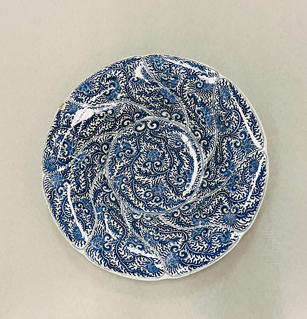 Plate with scalloped rim