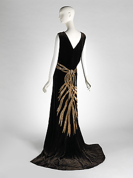 Chanel evening dress 1932, shown front and with capelet. Culture
