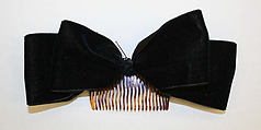 Bow, cotton, plastic, American