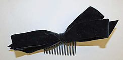 Bow, cotton, plastic, American