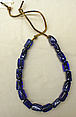 Necklace, leather, glass, probably American