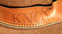 Fedora, (a) cardboard
(b) wool, American