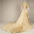 Wedding ensemble, Flaven (American), a) silk, wax
b,c) leather, metal, silk
d) wax, American