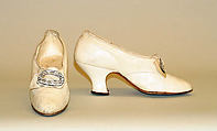 Wedding ensemble, Flaven (American), a) silk, wax
b,c) leather, metal, silk
d) wax, American