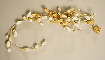 Wedding ensemble, Flaven (American), a) silk, wax
b,c) leather, metal, silk
d) wax, American