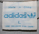 Athletic ensemble, (a,b) polyester/cotton
(c,d) leather, American