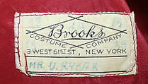 Fancy dress costume, Brooks Costume Company (American), (a) acetate, rayon, nylon
(b,c) silk
(d) rayon
(e, f) cotton
(i) rayon
(j) plastic, American