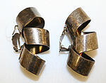 Earrings, metal, American or European