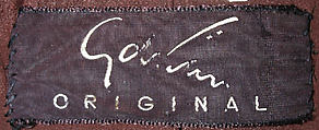 Suit, Gilbert Adrian (American, Naugatuck, Connecticut 1903–1959 Hollywood, California), (a) wool, rayon, plastic; (b) wool, American