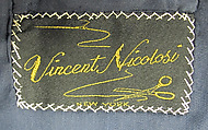 Suit, (a) wool; (b) wool; (c) silk; (d) silk, leather, metal; (e) cotton; (f) metal; (g, h) metal, enamel; (i) silk; (j, k) cotton, synthetic; (l, m) silk, leather, metal; (n, o) leather; (p) wool, silk, leather; (q) wood, rubber., American