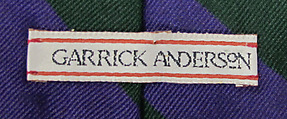 Suit, (a) cotton, synthetic; (b) cotton, synthetic, metal; (c) silk; (d) silk, leather, metal; (e) cotton; (f, g) metal, enamel; (h) silk; (i, j) cotton; (k, l) leather; (m) straw, silk, leather; (n) wood, horn, synthetic., American