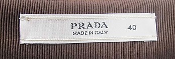 Ensemble, Prada (Italian, founded 1913), (a) wool, synthetic, (b) wool, silk, cotton, metal, (c) leather, metal, (d, e) leather, (f, g) leather, synthetic, metal, (h) leather, silk, metal, (i) leather, metal, Italian