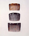 Side comb, plastic (cellulose nitrate), probably American