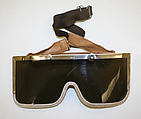 Ski goggles, plastic (cellulose nitrate, polyvinyl acetate), cellulosic fibers, metal, American
