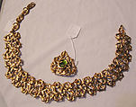 Jewelry set, Yves Saint Laurent French, a) metal; b) metal, glass, French