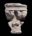 Double Capital, Limestone or sandstone, French
