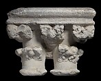 Double Capital, Limestone or sandstone, French