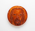 Medallion with the Face of Christ, Baltic amber with traces of paint, Polish