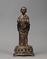 Priest holding a Reliquary, Copper gilt; reliquary vessel: silver, champleve enamel, glass, textile wrapped relic, North French