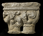 Double Capital, Limestone or sandstone, French