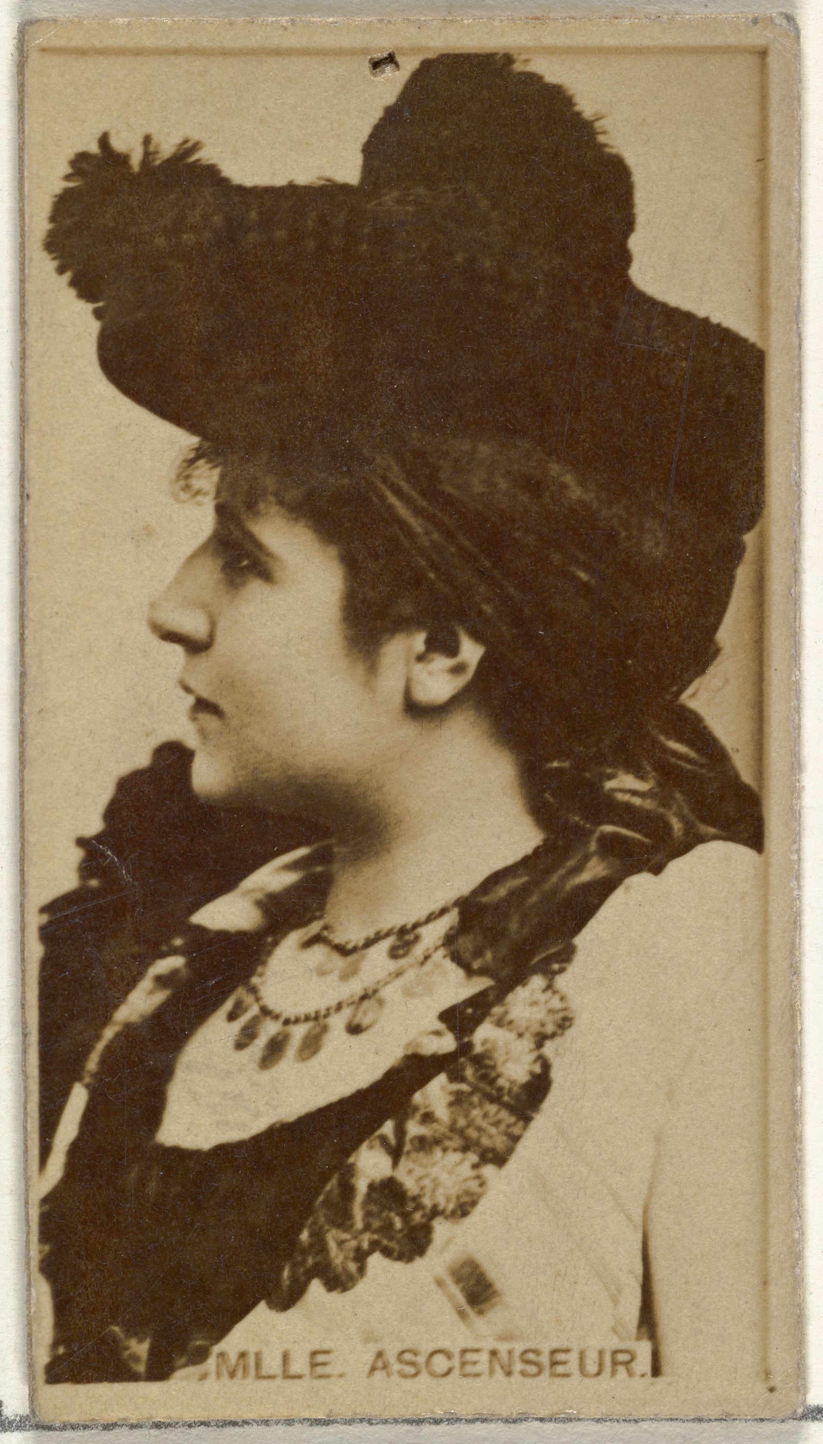 Mlle. Ascenseur, from the Actors and Actresses series (N145-8) issued by Duke Sons & Co. to promote Duke Cigarettes