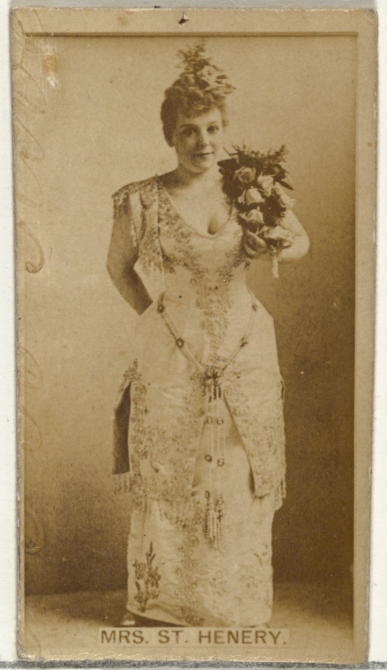 Mrs. St. Henery, from the Actors and Actresses series (N145-8) issued by Duke Sons & Co. to promote Duke Cigarettes