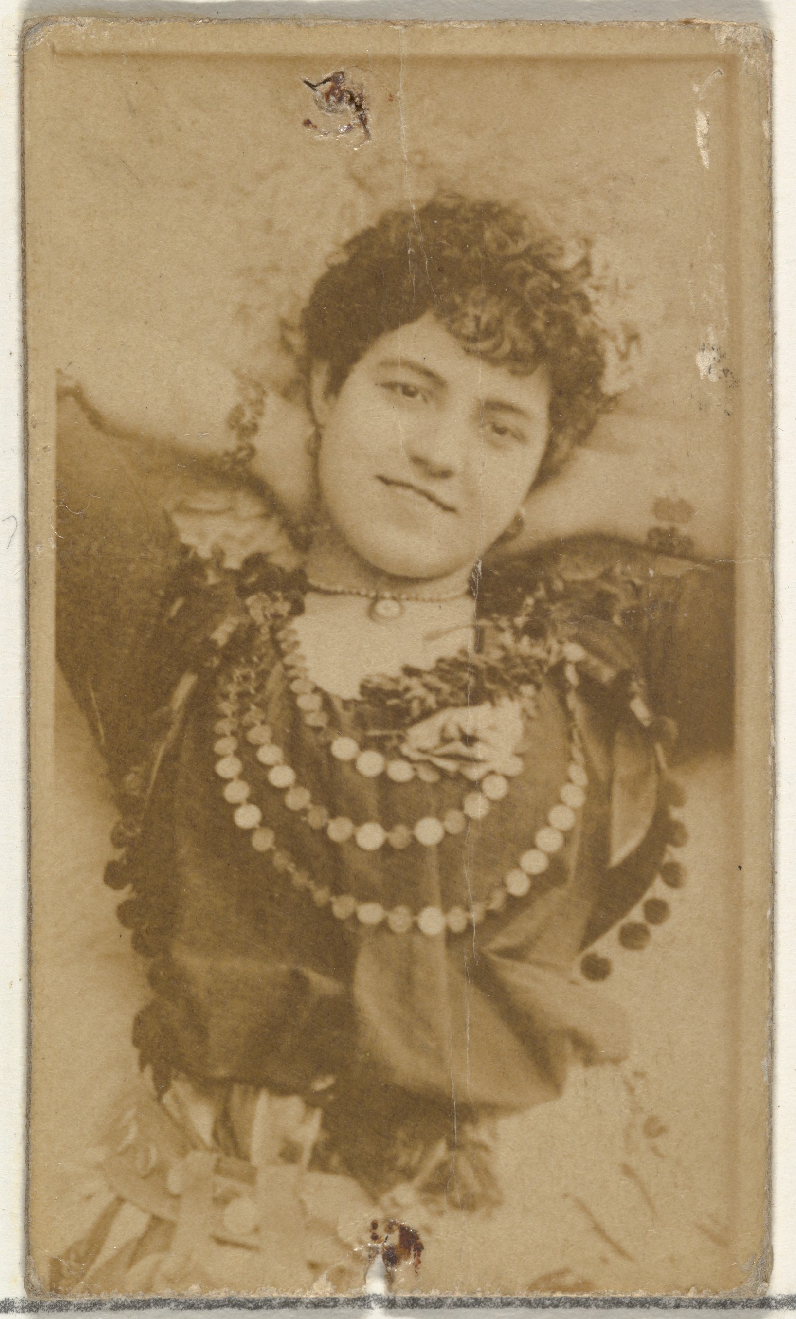 [Actress wearing choker necklace], from the Actors and Actresses series (N145-8) issued by Duke Sons & Co. to promote Duke Cigarettes