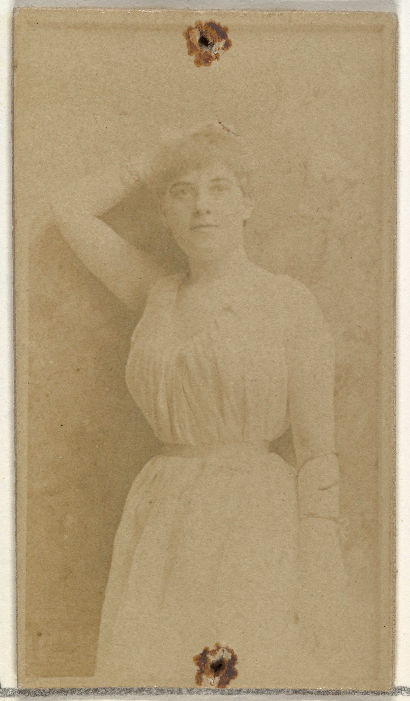 [Actress posing with hand over head], from the Actors and Actresses series (N145-8) issued by Duke Sons & Co. to promote Duke Cigarettes