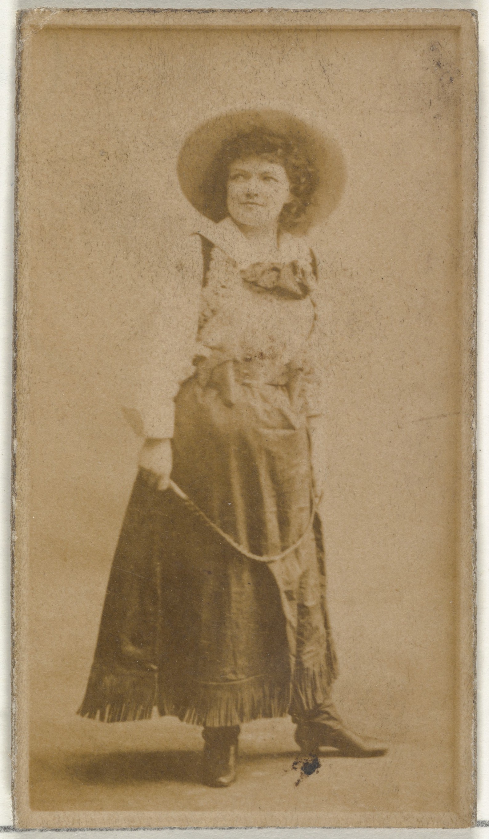 [Actress wearing wide-brimmed hat], from the Actors and Actresses series (N145-8) issued by Duke Sons & Co. to promote Duke Cigarettes