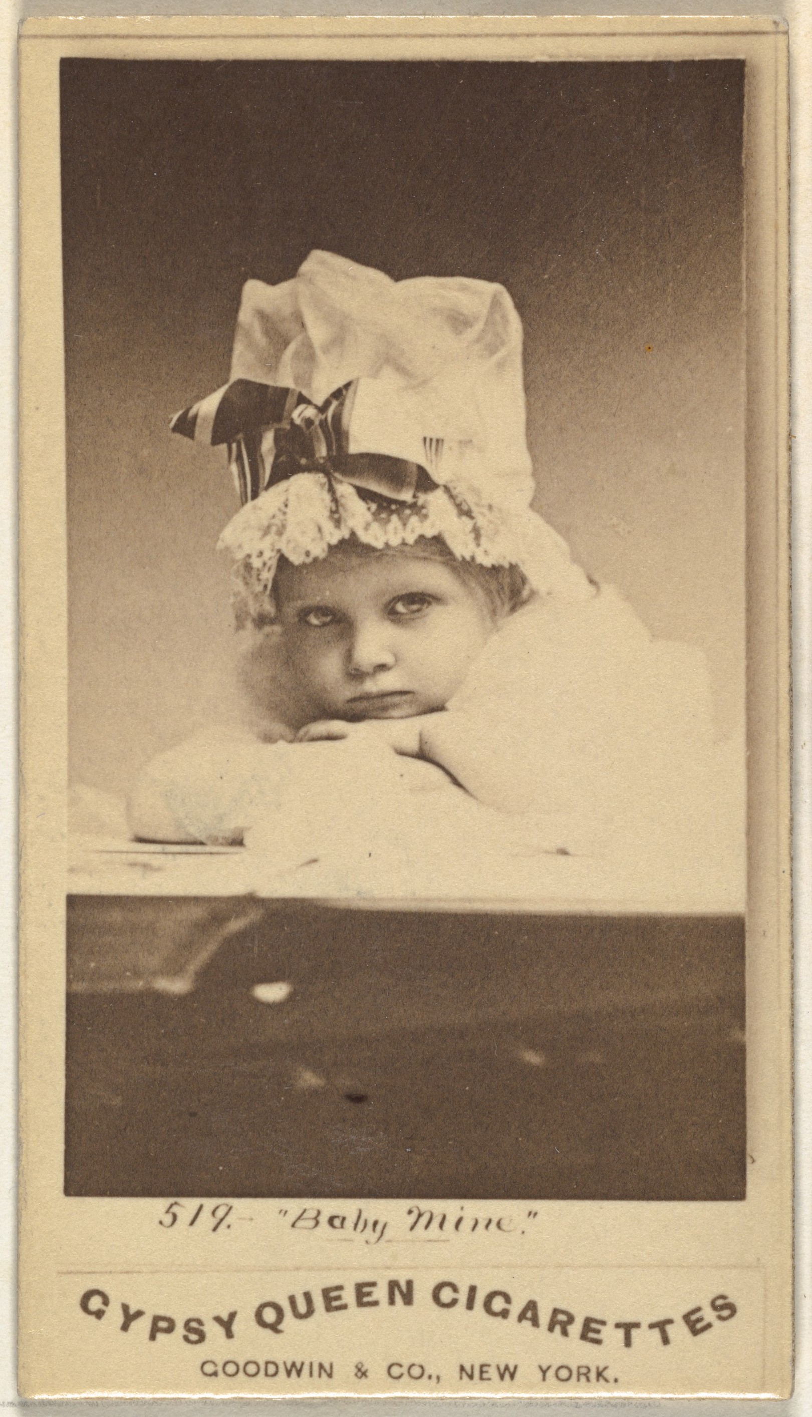 "Baby Mine", from the Actors and Actresses series (N171) for Old Judge Cigarettes