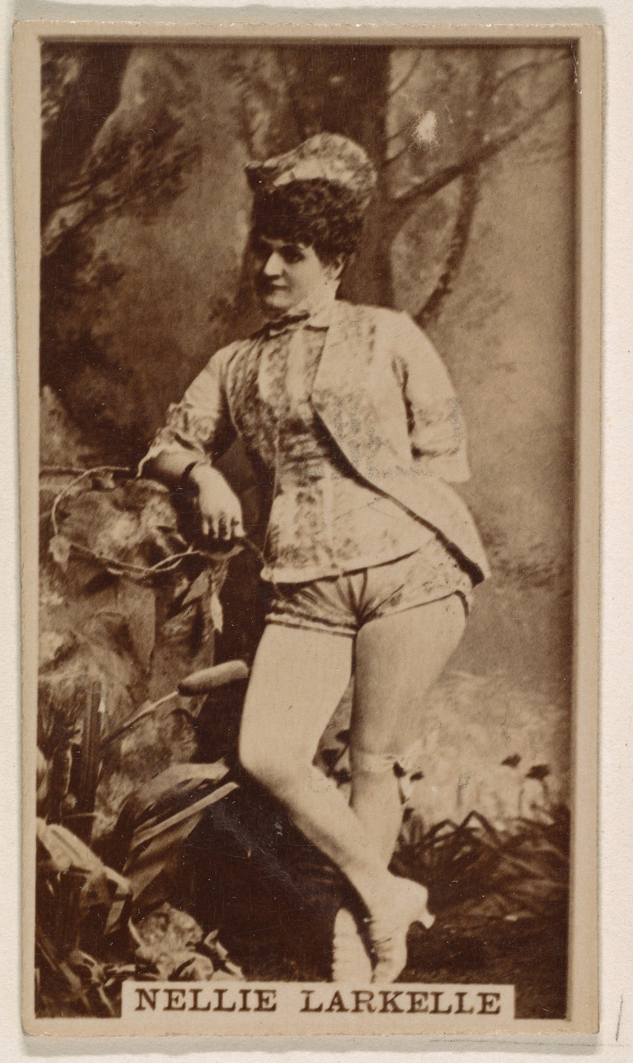 Nellie Larkelle, from the Actresses series (N245) issued by Kinney Brothers to promote Sweet Caporal Cigarettes