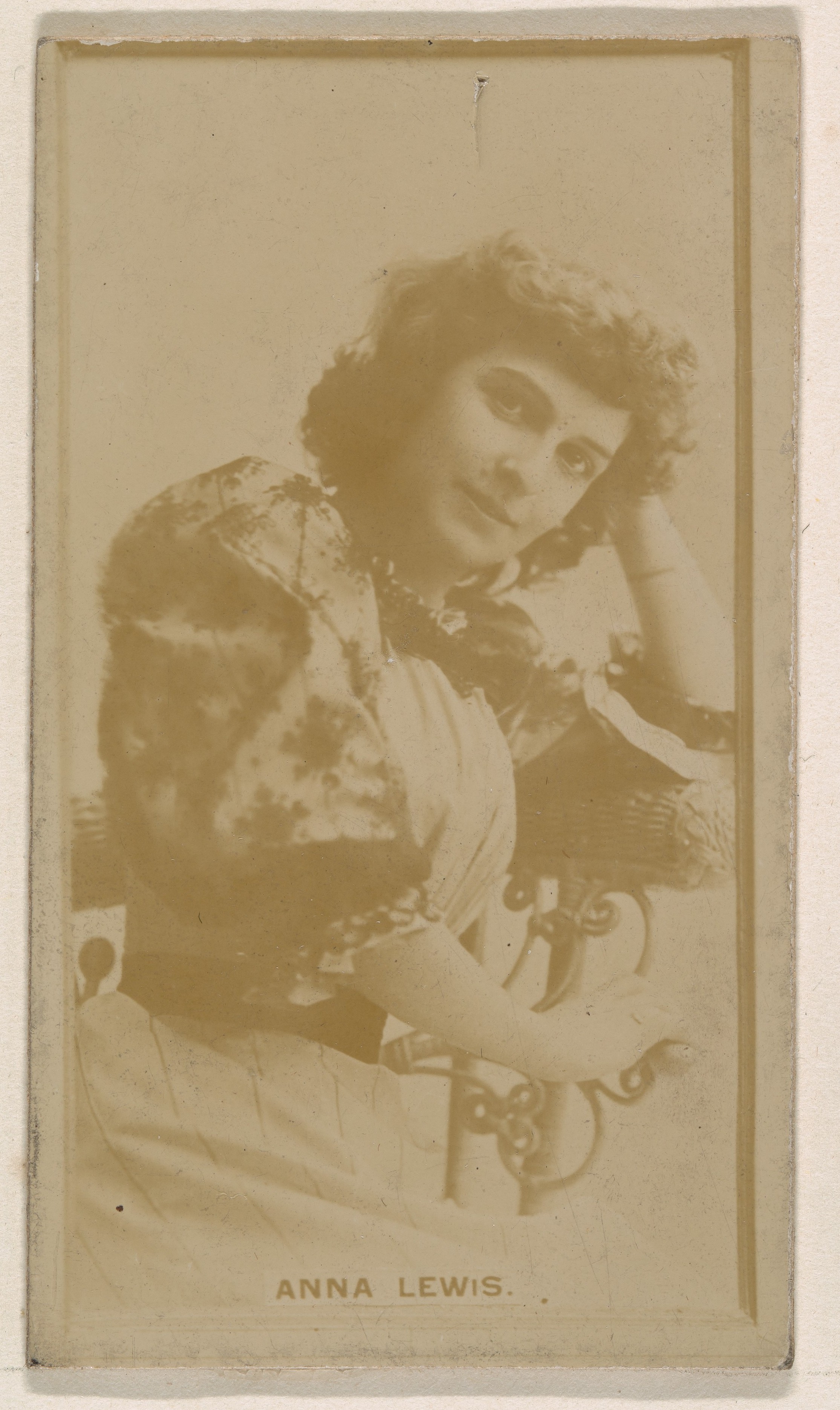 Anna Lewis, from the Actresses series (N245) issued by Kinney Brothers to promote Sweet Caporal Cigarettes
