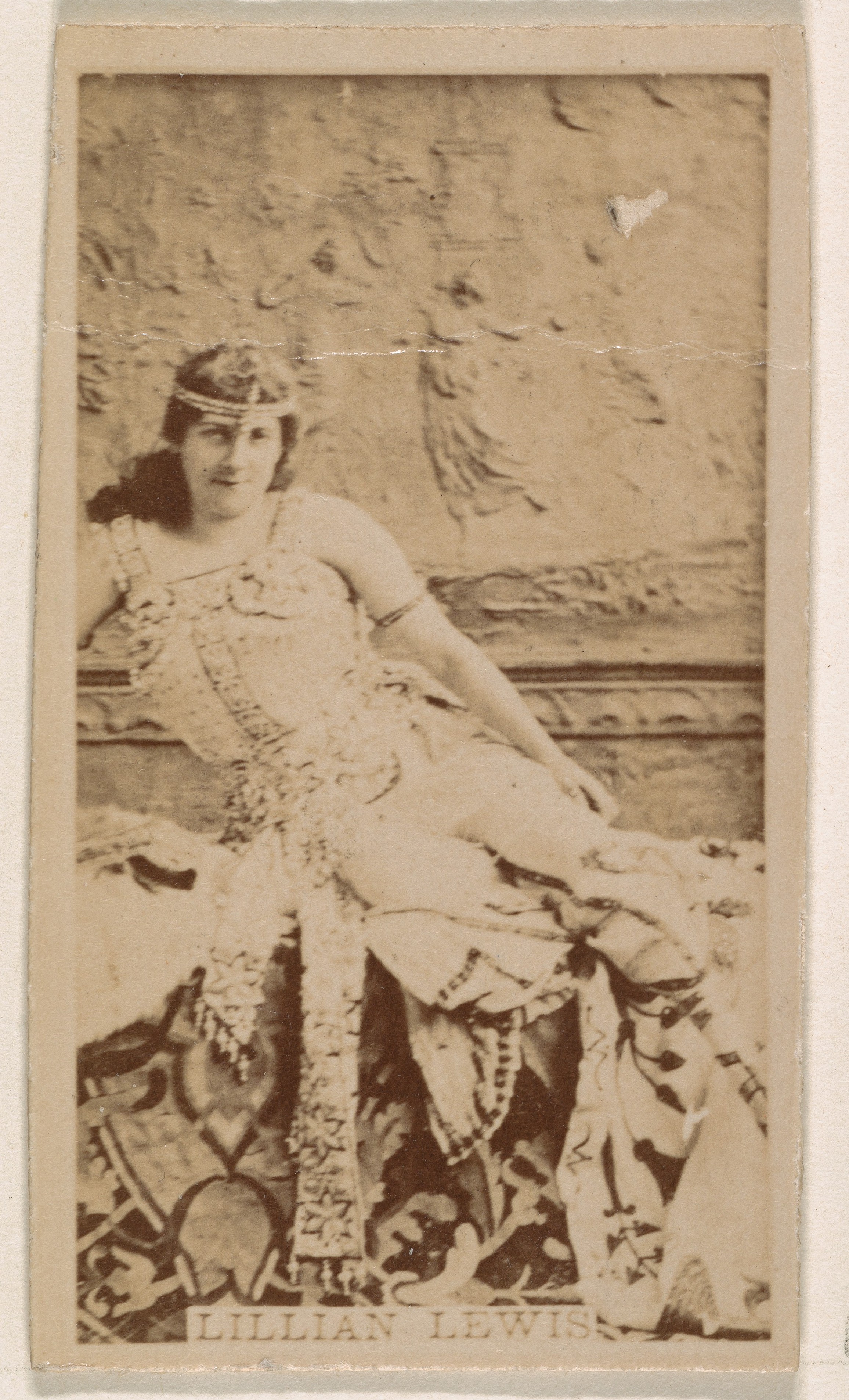 Lillian Lewis, from the Actresses series (N245) issued by Kinney Brothers to promote Sweet Caporal Cigarettes