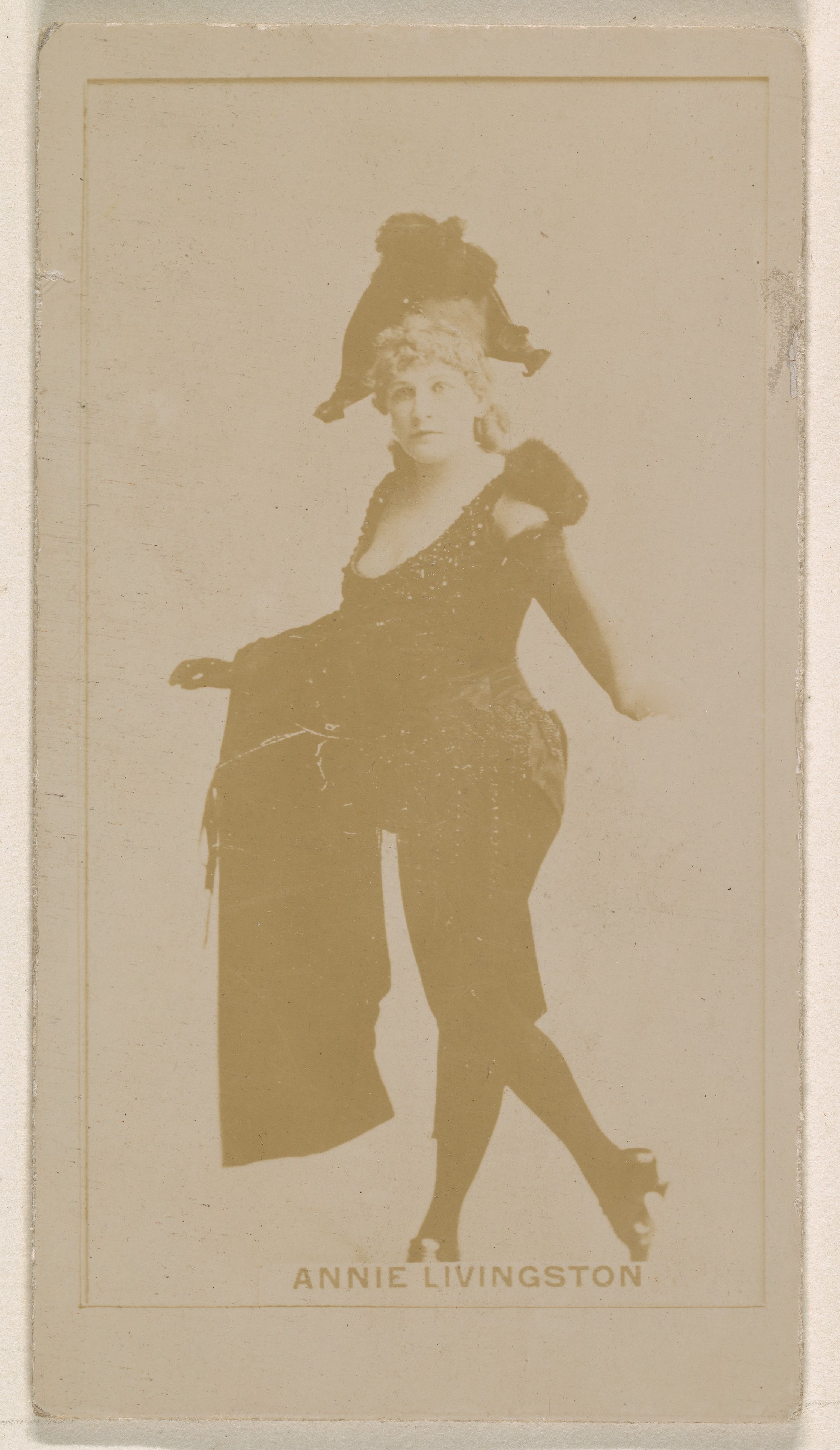 Annie Livingston, from the Actresses series (N245) issued by Kinney Brothers to promote Sweet Caporal Cigarettes