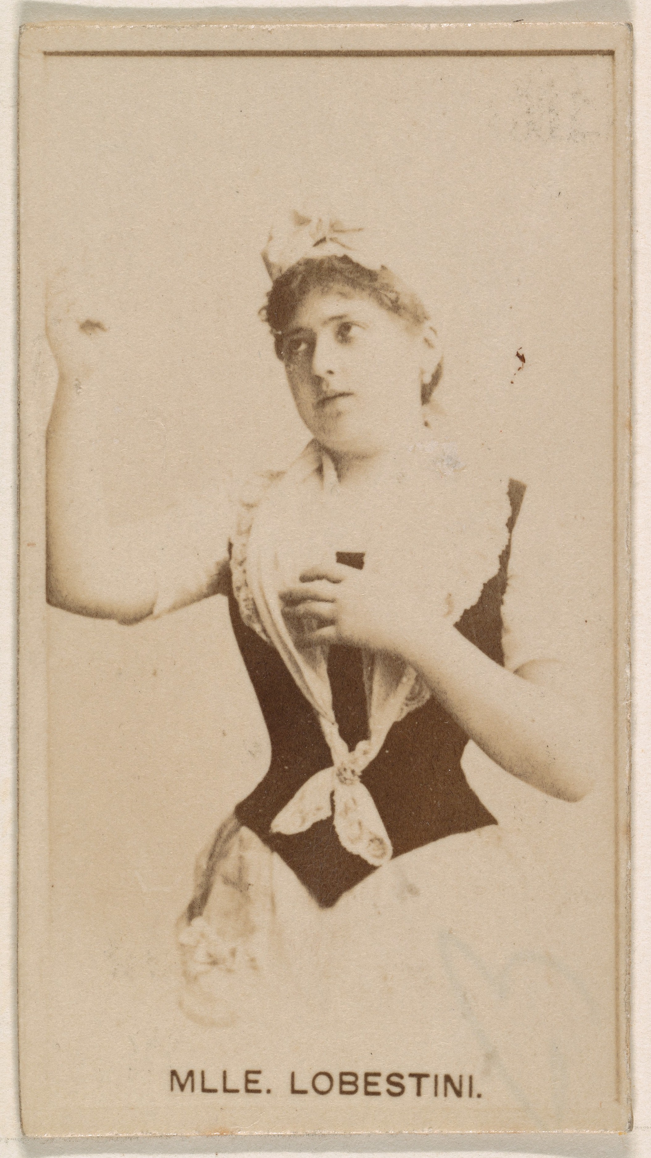 Mlle. Lobestini, from the Actresses series (N245) issued by Kinney Brothers to promote Sweet Caporal Cigarettes