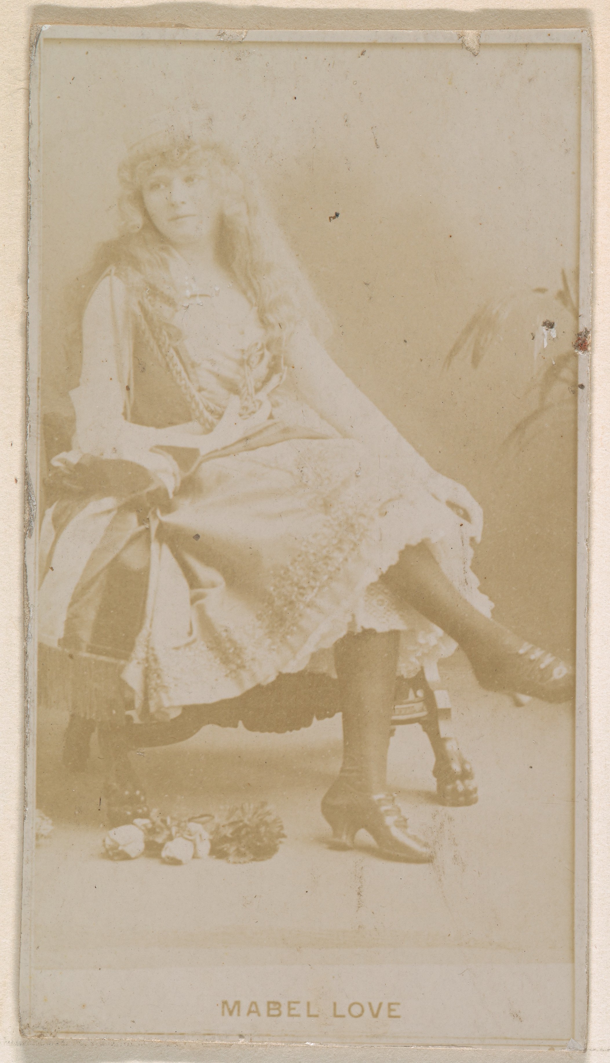 Miss Mabel Love, from the Actresses series (N245) issued by Kinney Brothers to promote Sweet Caporal Cigarettes