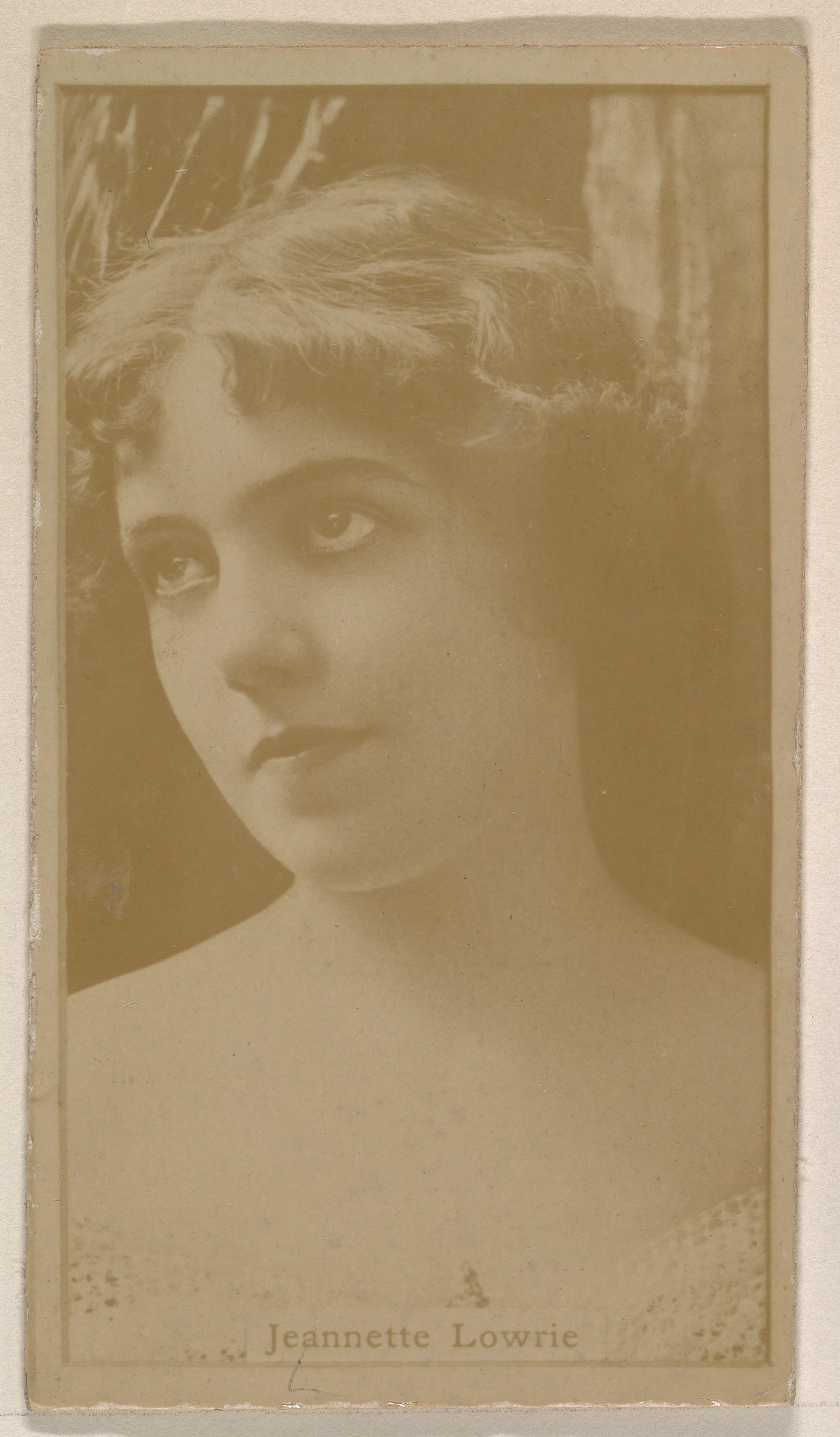 Jeannette Lowrie, from the Actresses series (N245) issued by Kinney Brothers to promote Sweet Caporal Cigarettes