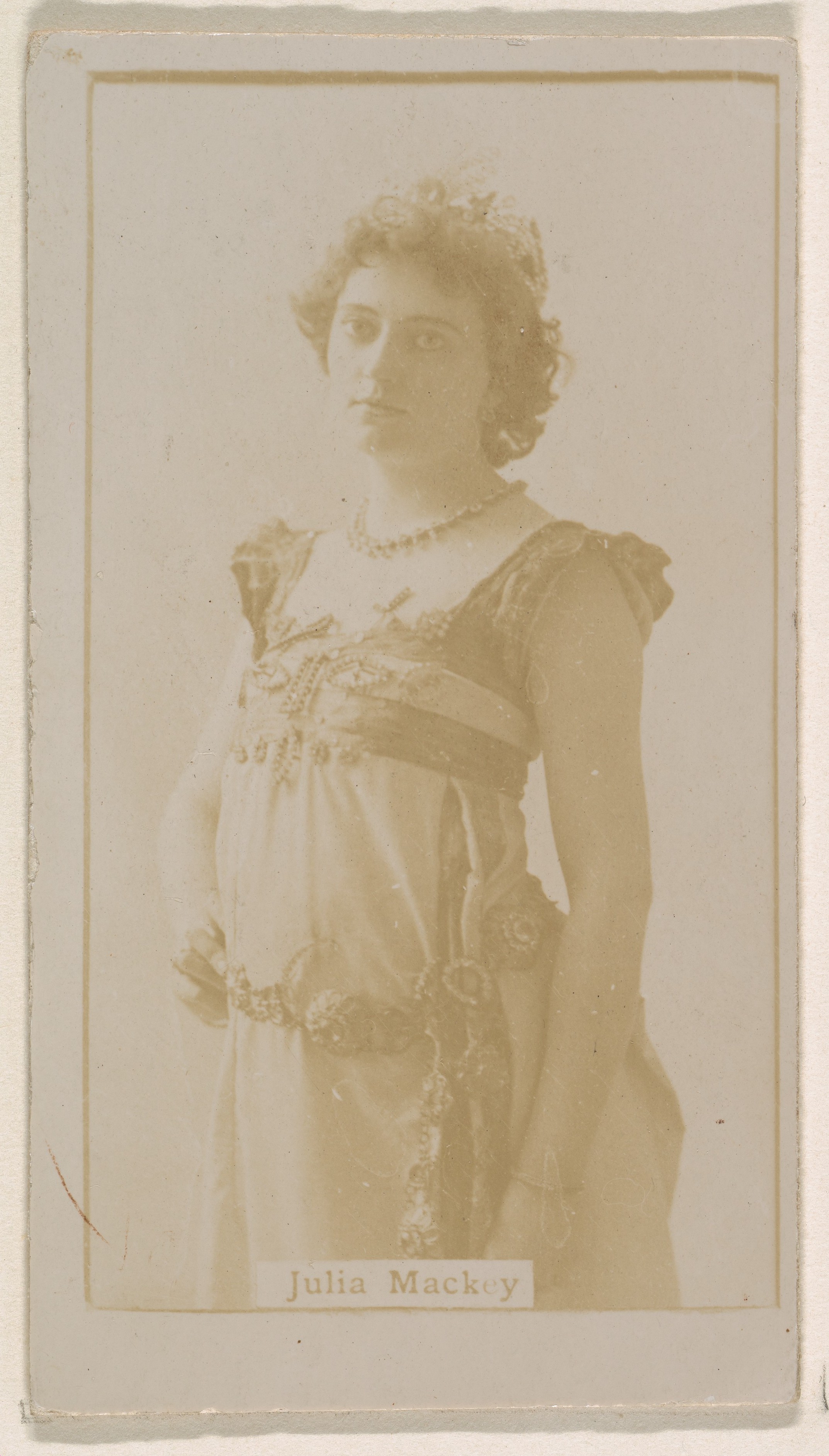 Julia Mackey, from the Actresses series (N245) issued by Kinney Brothers to promote Sweet Caporal Cigarettes