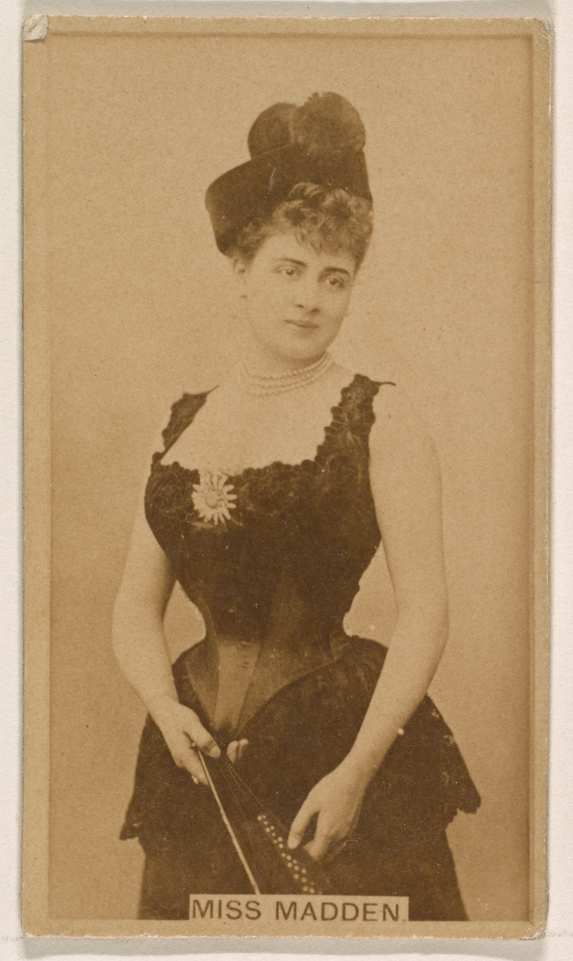 Miss Madden, from the Actresses series (N245) issued by Kinney Brothers to promote Sweet Caporal Cigarettes