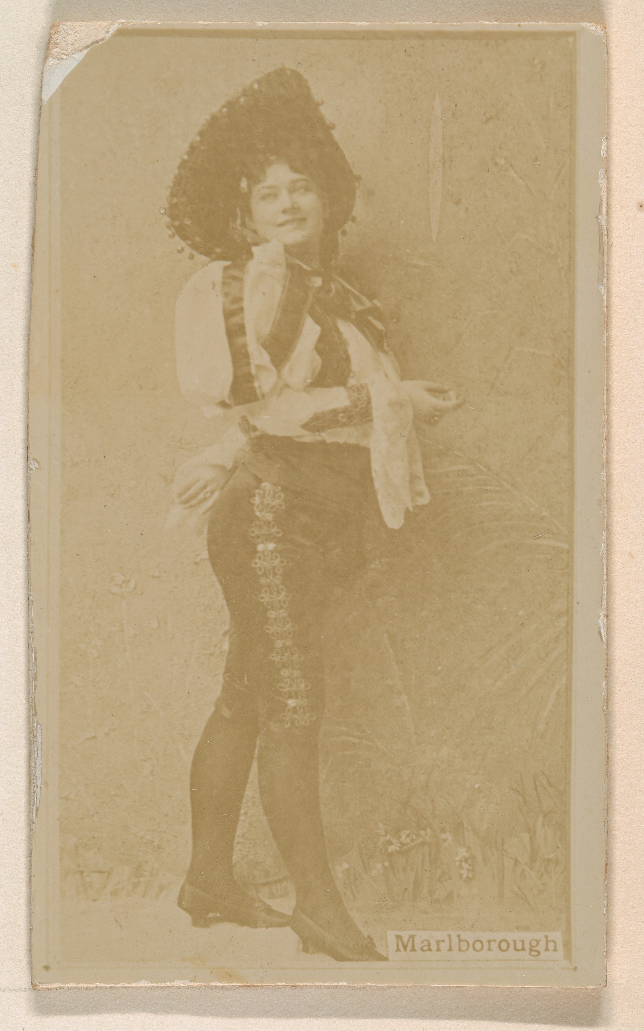 Miss Marlborough, from the Actresses series (N245) issued by Kinney Brothers to promote Sweet Caporal Cigarettes