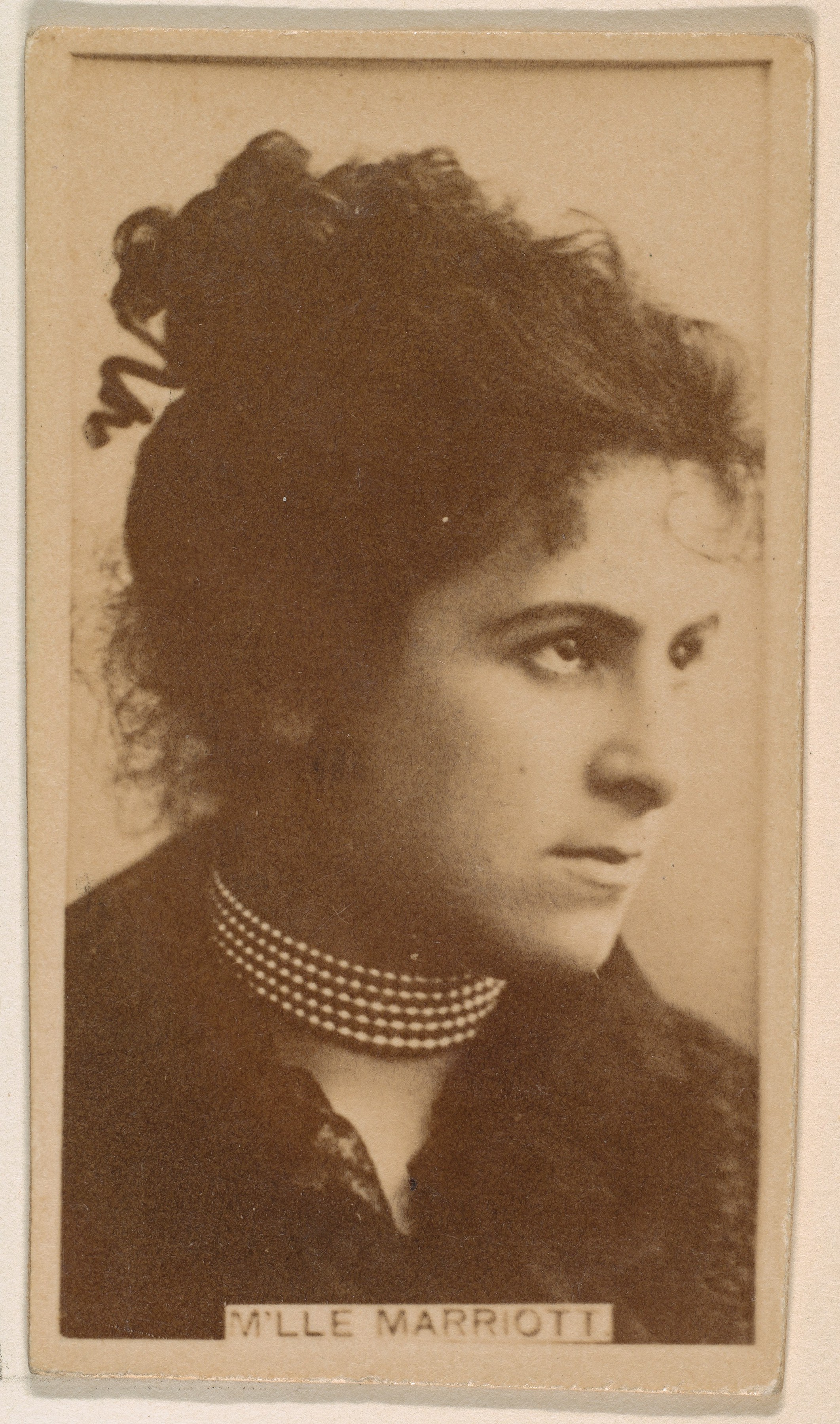 M'lle Marriott, from the Actresses series (N245) issued by Kinney Brothers to promote Sweet Caporal Cigarettes