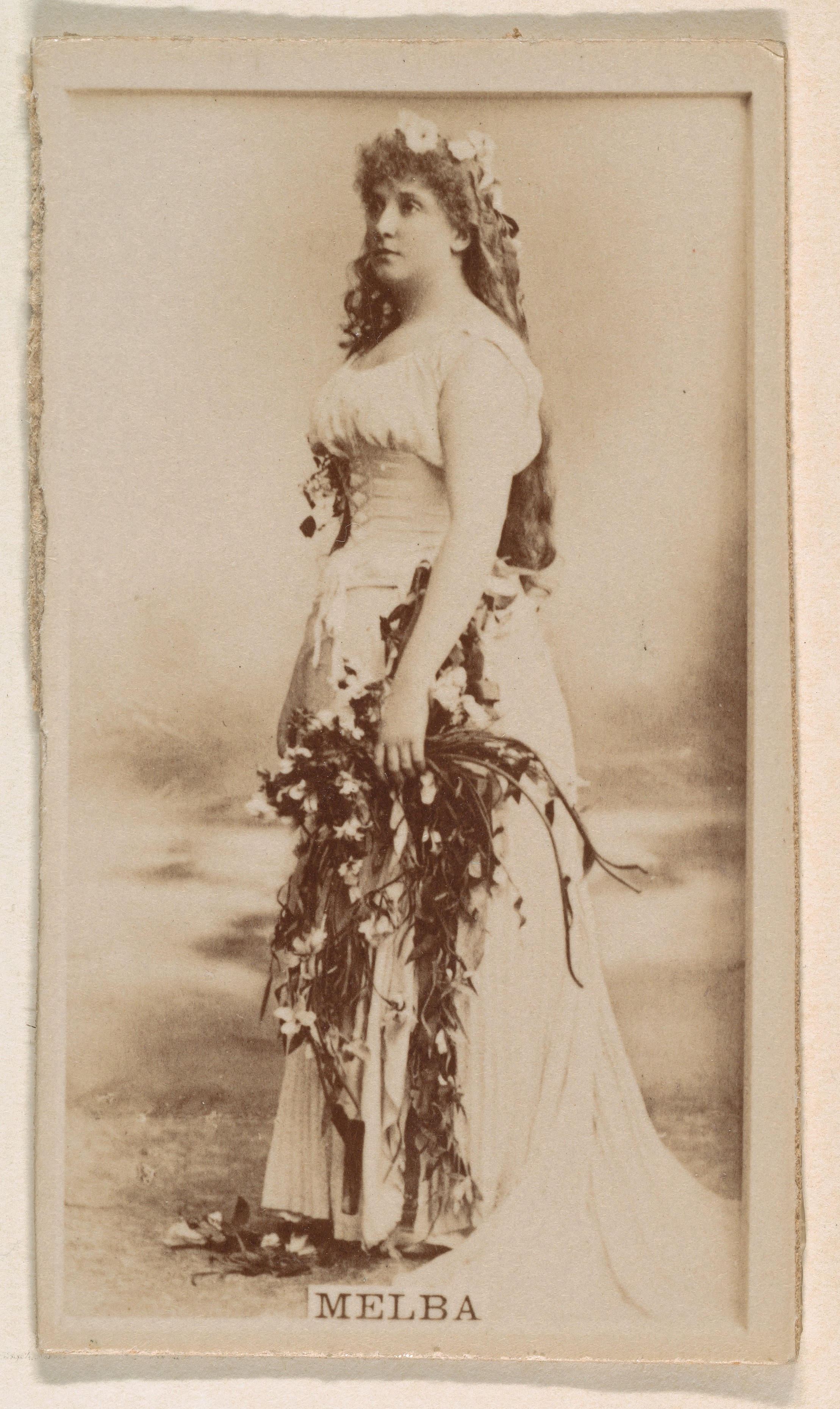 Miss Melba, from the Actresses series (N245) issued by Kinney Brothers to promote Sweet Caporal Cigarettes