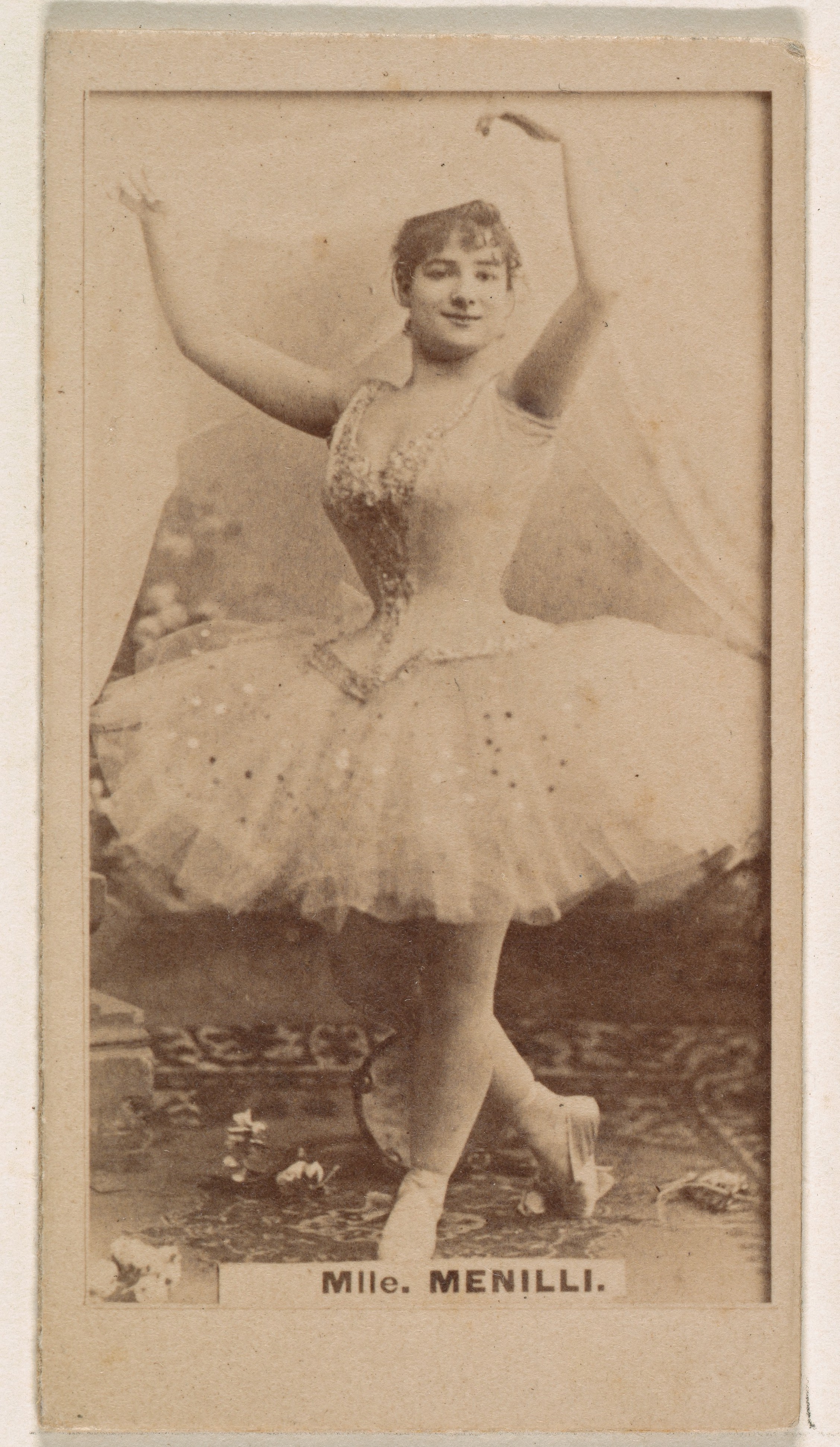 Mlle. Menilli, from the Actresses series (N245) issued by Kinney Brothers to promote Sweet Caporal Cigarettes