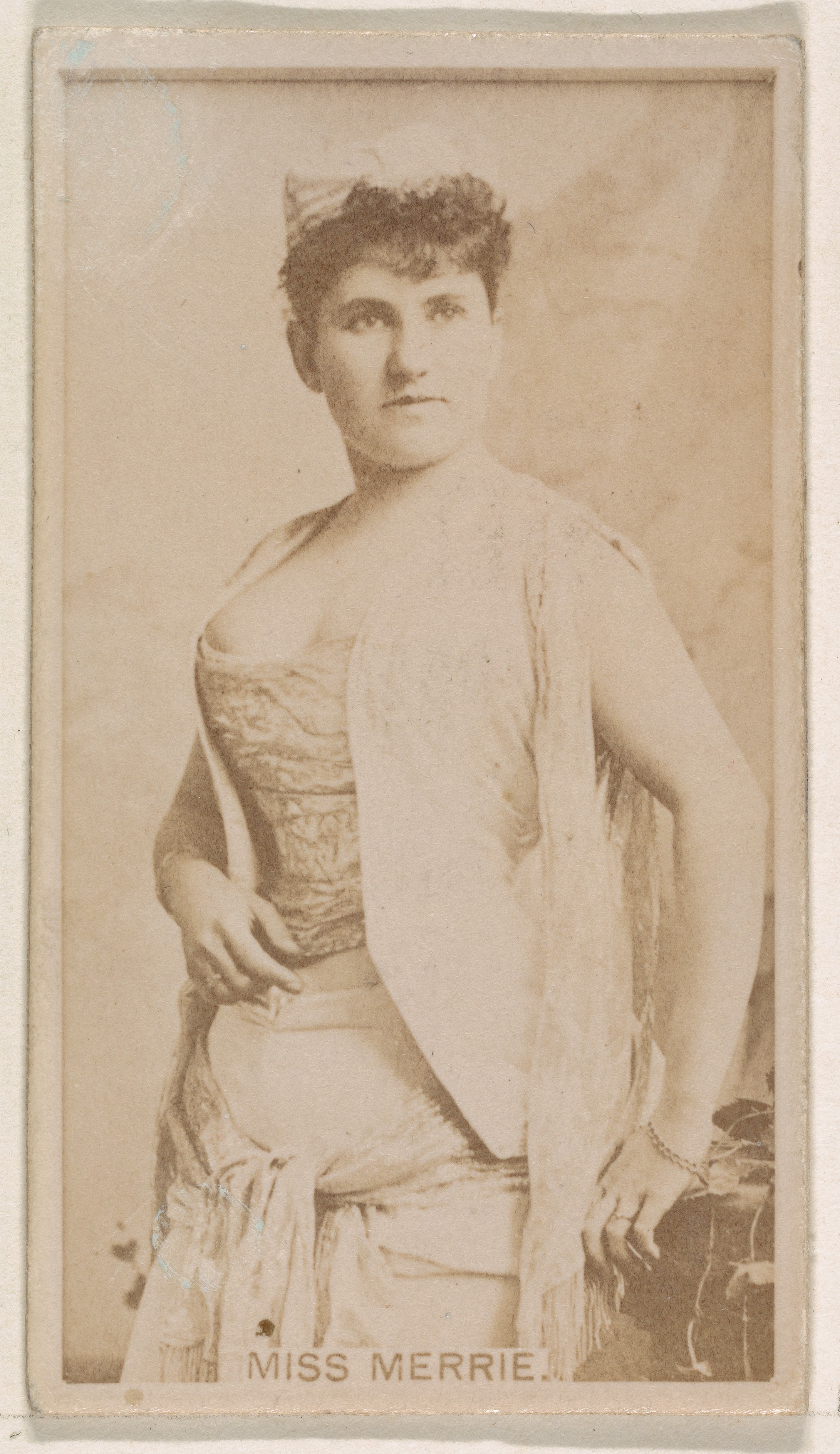 Miss Merrie, from the Actresses series (N245) issued by Kinney Brothers to promote Sweet Caporal Cigarettes