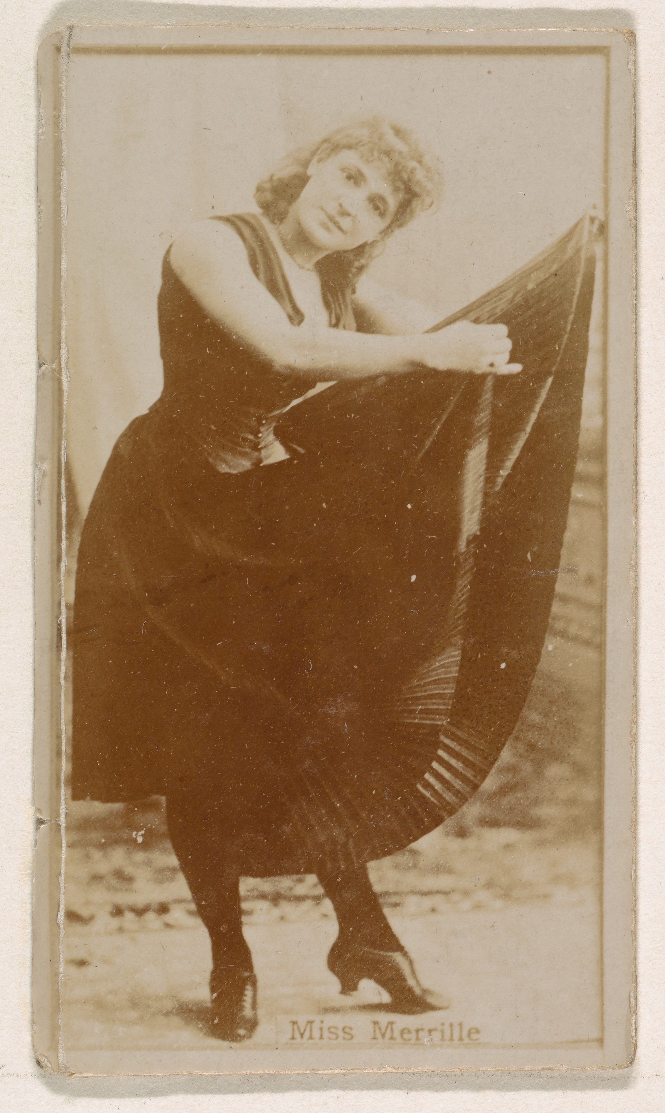 Miss Merrille, from the Actresses series (N245) issued by Kinney Brothers to promote Sweet Caporal Cigarettes