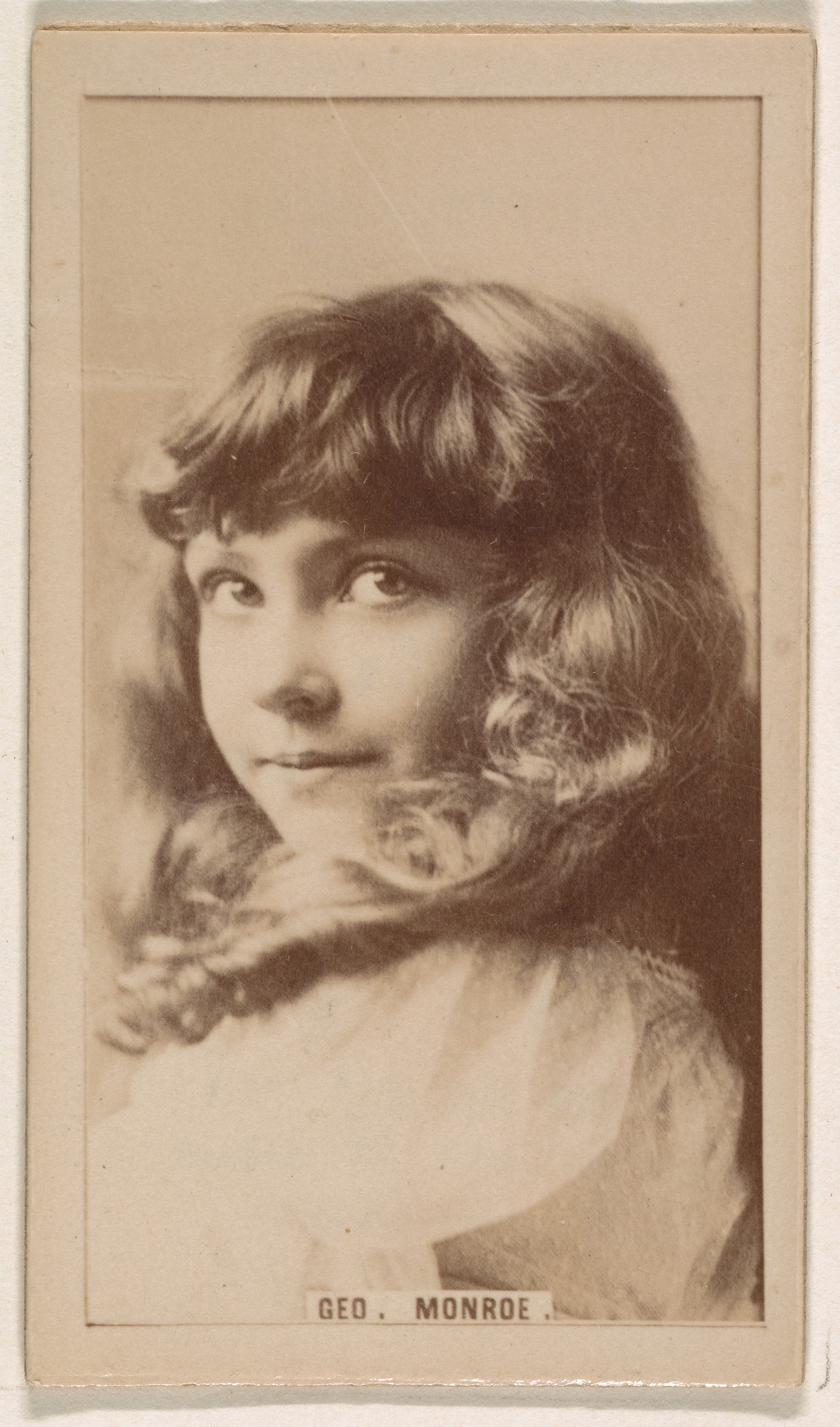 Geo. Monroe, from the Actresses series (N245) issued by Kinney Brothers to promote Sweet Caporal Cigarettes