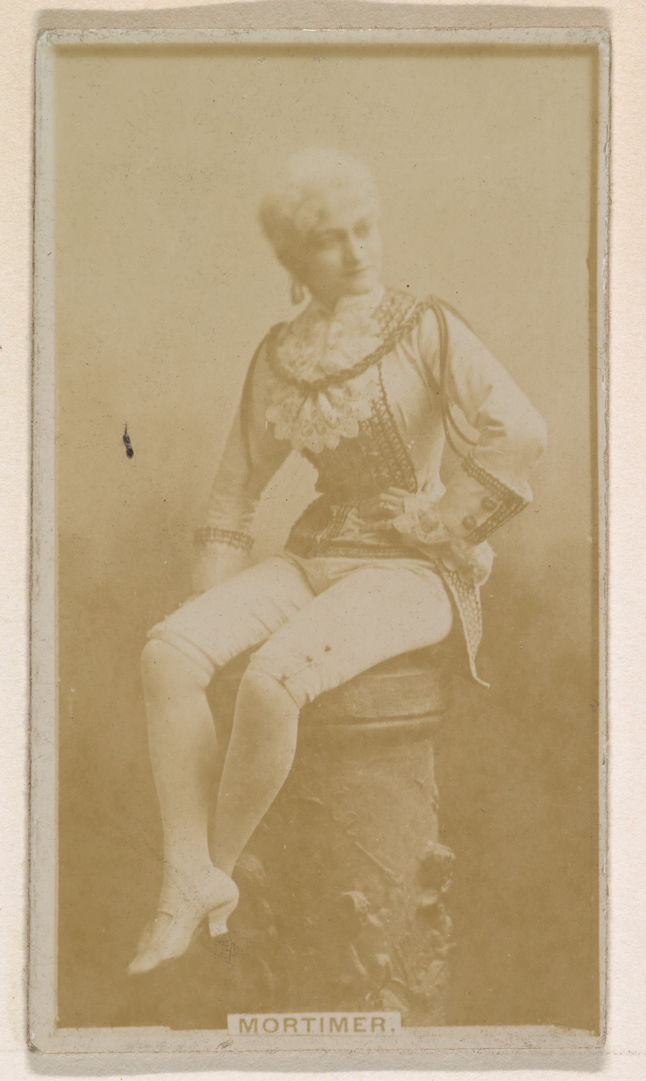 Miss Mortimer, from the Actresses series (N245) issued by Kinney Brothers to promote Sweet Caporal Cigarettes