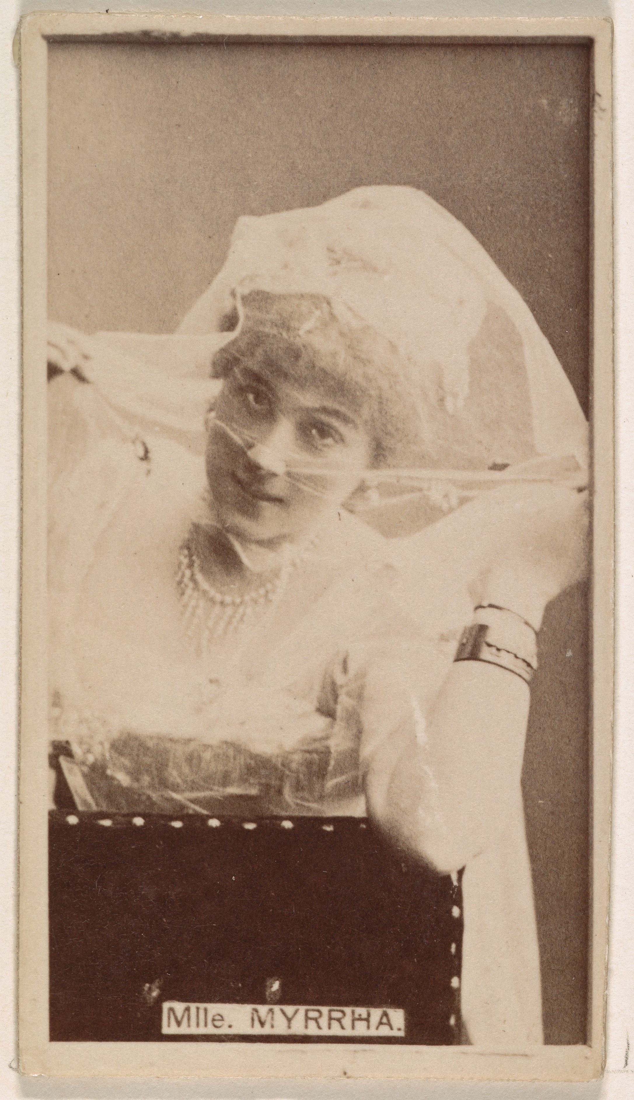 Mlle. Myrrha, from the Actresses series (N245) issued by Kinney Brothers to promote Sweet Caporal Cigarettes