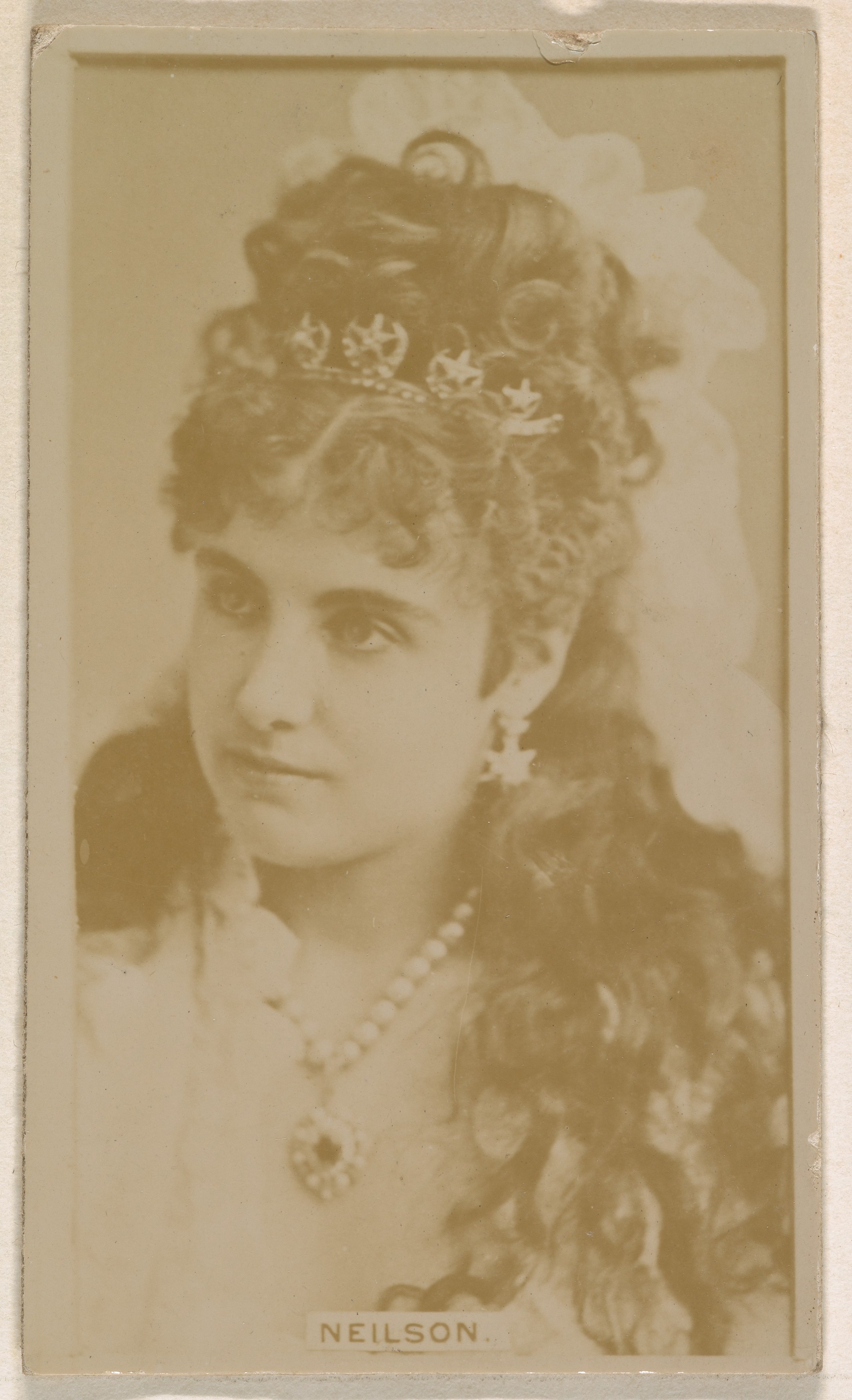 Miss Neilson, from the Actresses series (N245) issued by Kinney Brothers to promote Sweet Caporal Cigarettes