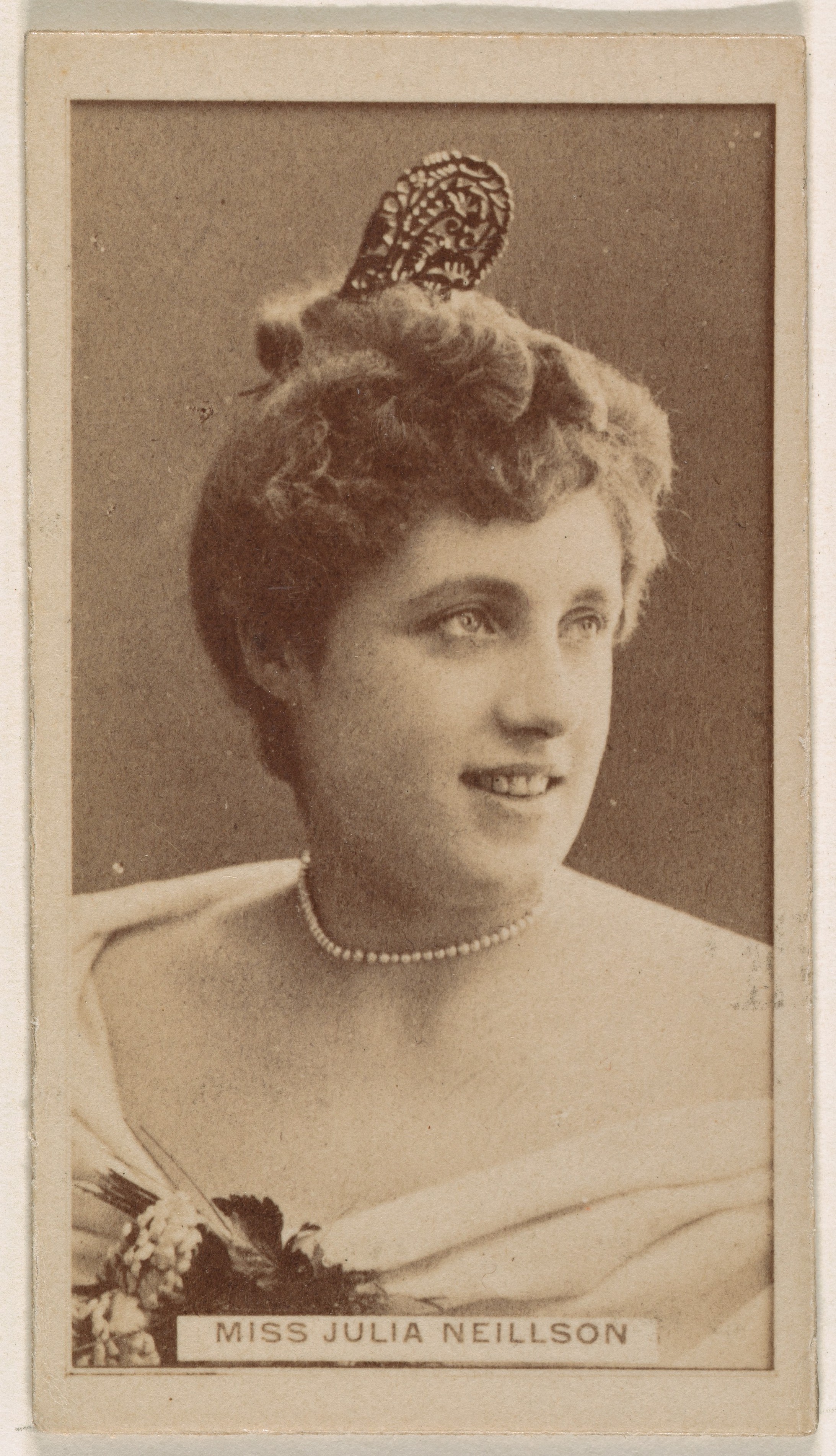 Miss Julia Neillson, from the Actresses series (N245) issued by Kinney Brothers to promote Sweet Caporal Cigarettes